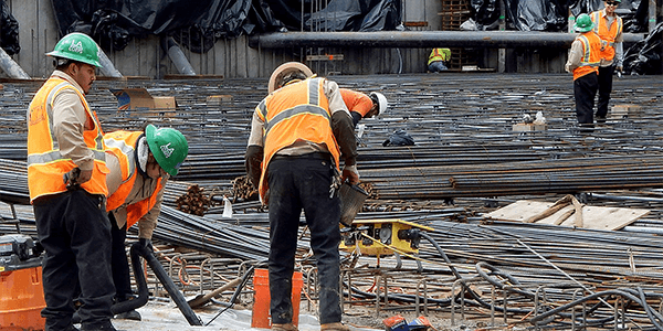 construction workers beginning the structural phase on the Terasaki Budokan community center