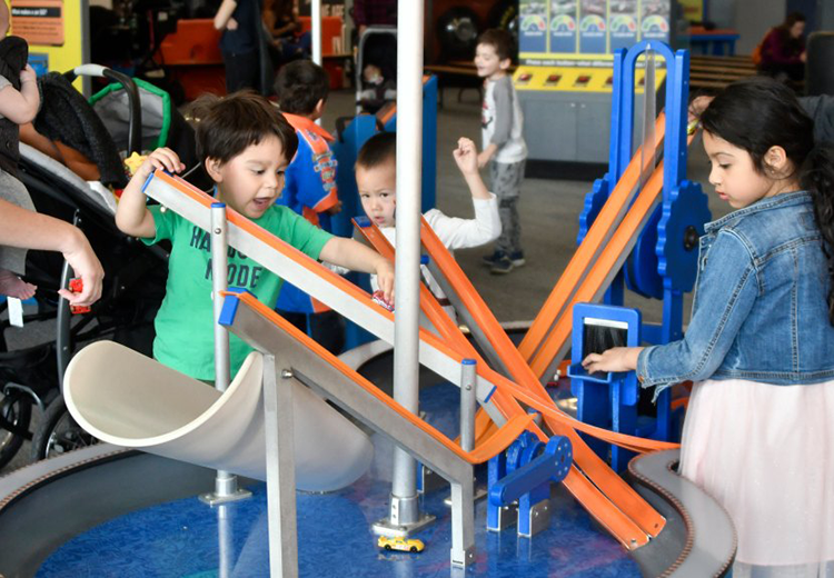 Kids play at a Hot Wheels exhibit at Discovery Cube LA on Saturday January 27,2019 (photo by Gene Blevins)