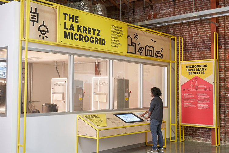 A La Kretz tour participant learns about the microgrid that generates, stores, and distributes clean energy throughout the campus, including the LA Cleantech Incubator (LACI)